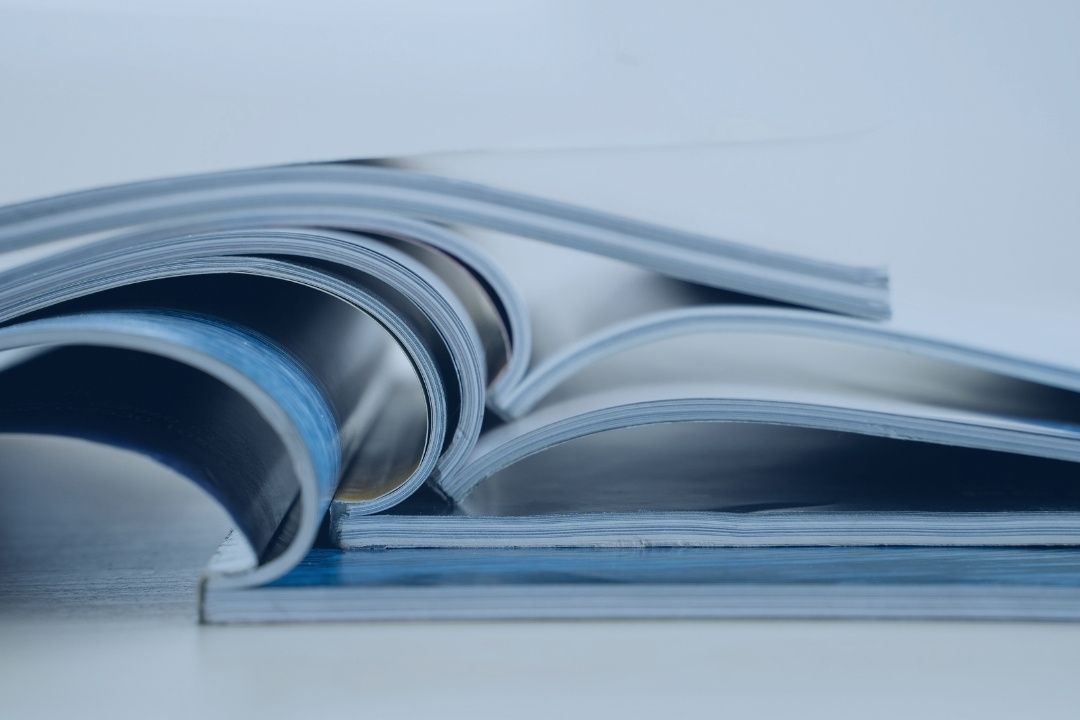 Publication newspaper and journal books background and catalog design article magazine press Newspaper with tablet by onephoto